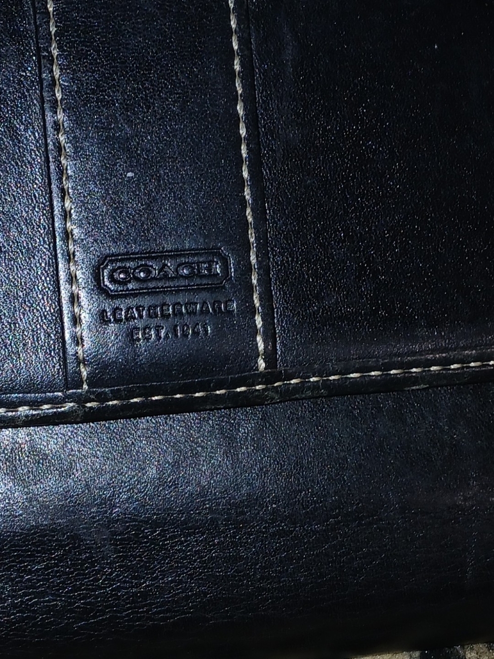 Coach Black Leather Bi-Fold Wallet with Contrast Stitching